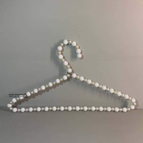 چوب-لباسی-مرواریدی.jpg چوب لباسی مرواریدی - تصویر 1